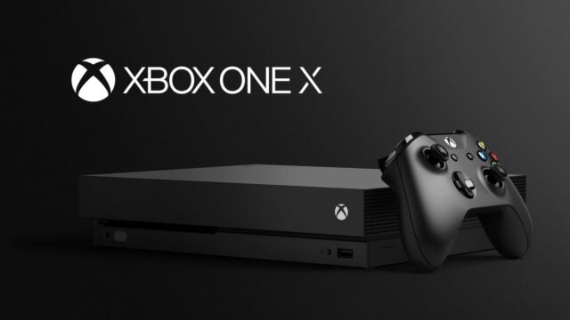 Main photo Xbox One X : "Peut-être la dernière console traditionnelle de Microsoft"